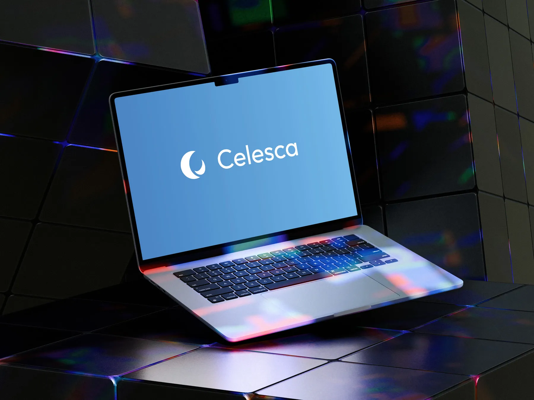 Celesca logo on a laptop screen, set against dark reflective tiles