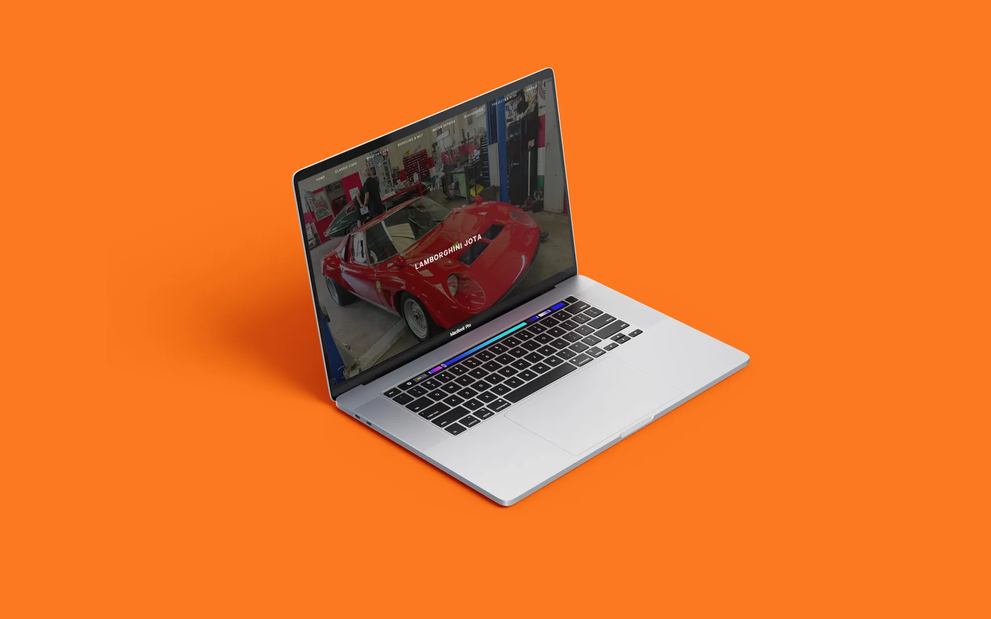 Jworx Automotive website showing a red Lamborghini Jota, on a laptop against an orange background